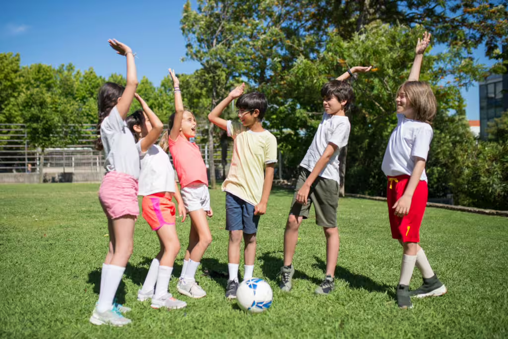 How to Teach Your Child the Basics of Teamwork Through Sports